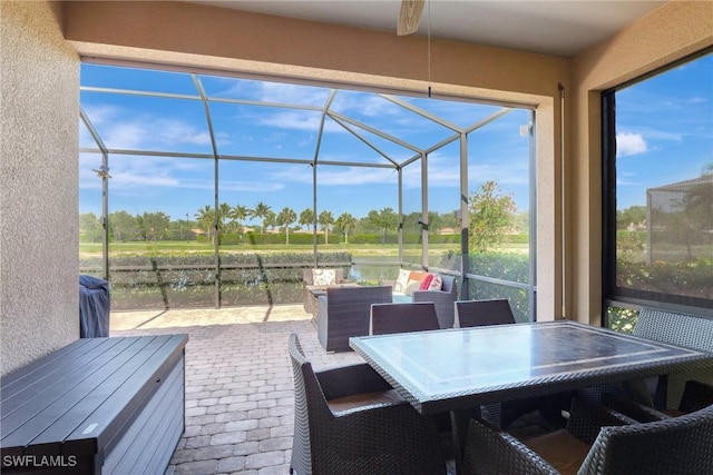 view of patio / terrace with glass enclosure