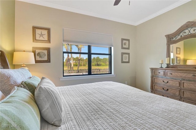 bedroom with crown molding and ceiling fan