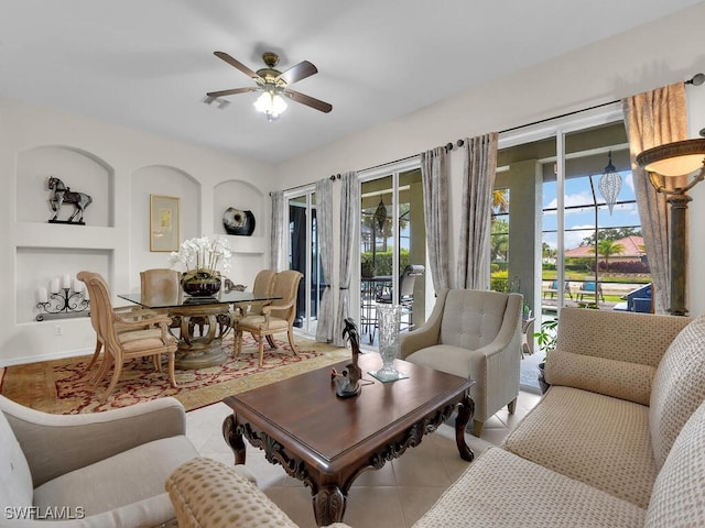 12156 Ledgewood Cir, Fort Myers, FL 33913 - living area with light tile patterned floors, a healthy amount of sunlight, ceiling fan, and visible vents