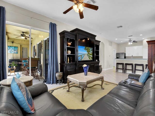 12156 Ledgewood Cir, Fort Myers, FL 33913 - living room with light tile patterned floors, a ceiling fan, visible vents, and recessed lighting