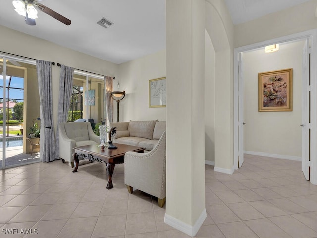 12156 Ledgewood Cir, Fort Myers, FL 33913 - living area with ceiling fan, baseboards, light tile patterned floors, and visible vents