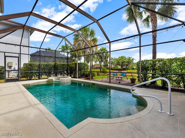 12156 Ledgewood Cir, Fort Myers, FL 33913 - view of swimming pool with a patio, a pool with connected hot tub, and a lanai