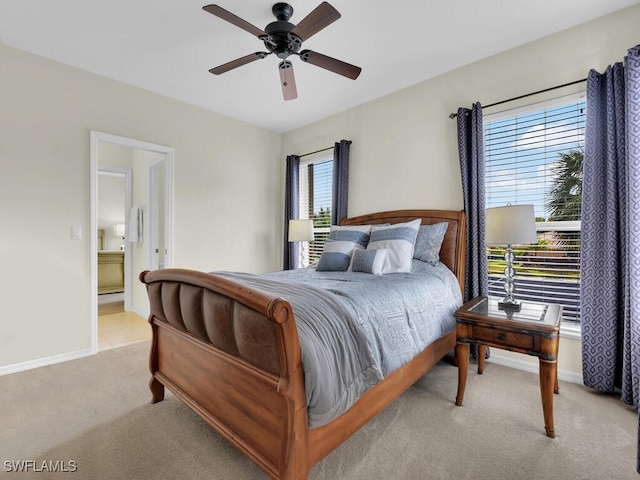 12156 Ledgewood Cir, Fort Myers, FL 33913 - bedroom with ceiling fan, light carpet, and baseboards