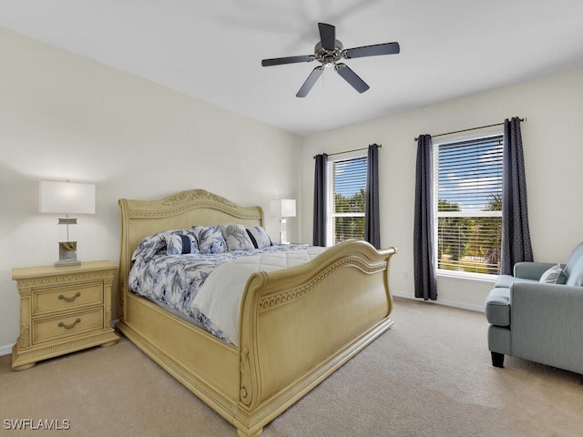 12156 Ledgewood Cir, Fort Myers, FL 33913 - bedroom featuring light colored carpet, baseboards, and ceiling fan