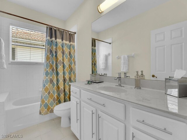 12156 Ledgewood Cir, Fort Myers, FL 33913 - full bathroom featuring toilet, shower / tub combo, tile patterned flooring, and vanity