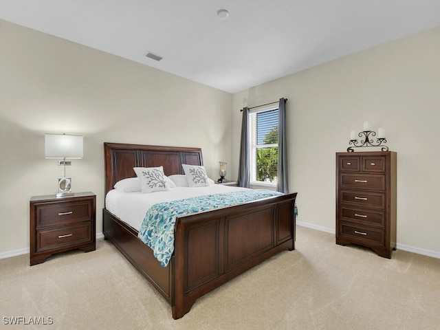 12156 Ledgewood Cir, Fort Myers, FL 33913 - bedroom featuring baseboards, light carpet, and visible vents