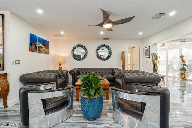 living area featuring ceiling fan, recessed lighting, and visible vents