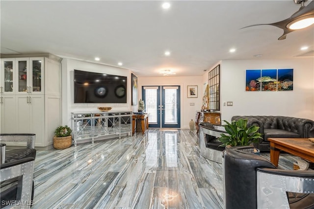 living room featuring recessed lighting, baseboards, and french doors