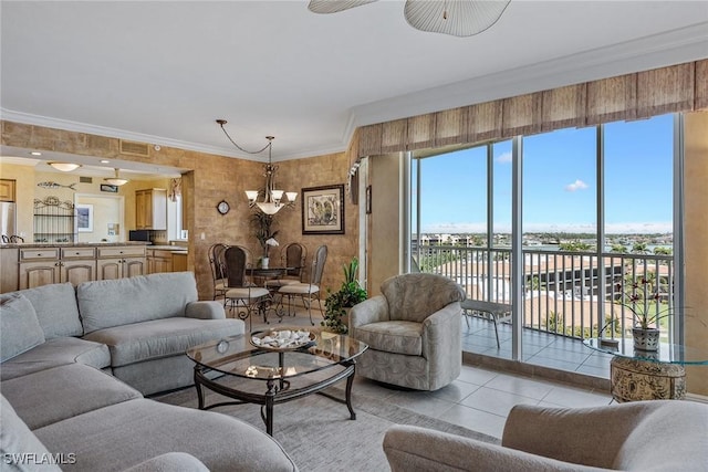 living area featuring a notable chandelier, plenty of natural light, and light tile patterned floors