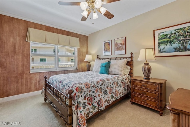 bedroom featuring carpet floors, baseboards, and ceiling fan