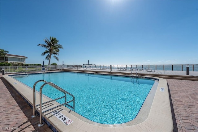 pool featuring fence