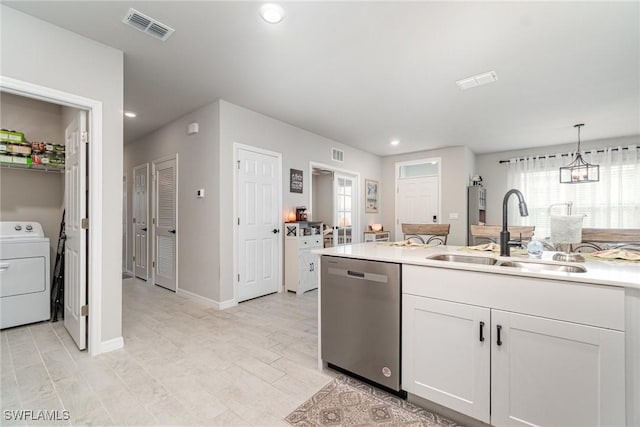 kitchen with visible vents, washer / clothes dryer, white cabinetry, a sink, and dishwasher