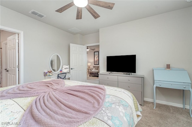 bedroom with baseboards, ceiling fan, light colored carpet, and visible vents