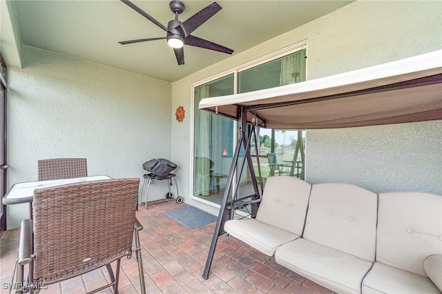 exterior space with a ceiling fan and outdoor dining space