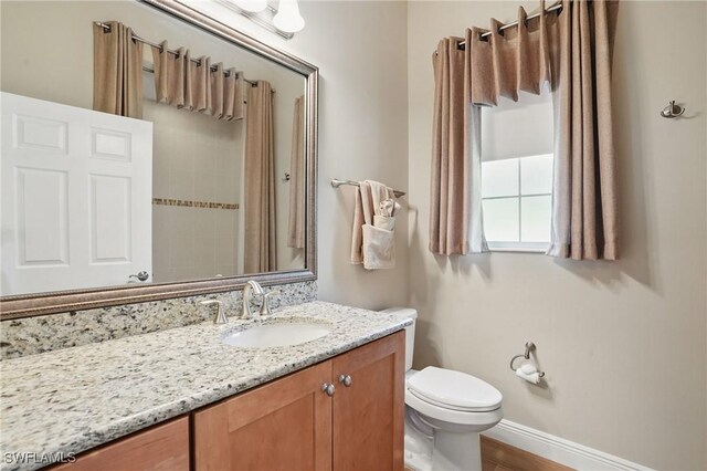 10419 Materita Dr, Fort Myers, FL 33913 - full bath featuring toilet and vanity
