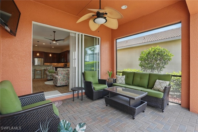 10419 Materita Dr, Fort Myers, FL 33913 - view of patio featuring ceiling fan and an outdoor living space