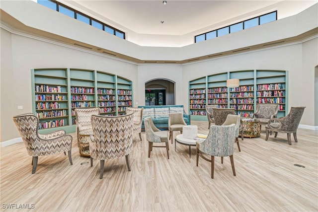 10419 Materita Dr, Fort Myers, FL 33913 - dining area featuring a towering ceiling and wood finished floors