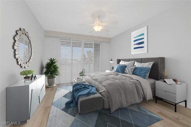 9380 Gulf Shore Dr Unit 101, Naples, FL 34108 - bedroom with light wood-style floors and a ceiling fan