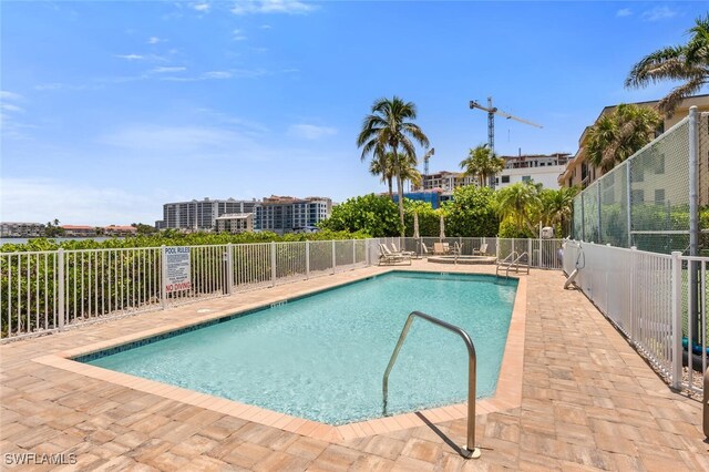 9380 Gulf Shore Dr Unit 101, Naples, FL 34108 - community pool with a patio area
