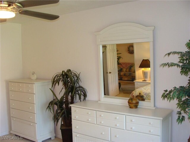 4070 Looking Glass Ln Unit 3101, Naples, FL 34112 - bedroom with ceiling fan