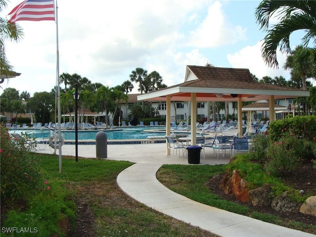 4070 Looking Glass Ln Unit 3101, Naples, FL 34112 - community pool featuring a gazebo and a patio