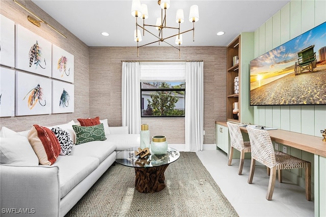 living room with recessed lighting and a notable chandelier