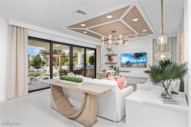 living area with an inviting chandelier, finished concrete flooring, recessed lighting, visible vents, and wood ceiling