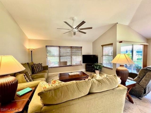 1106 Islamorada Blvd, Punta Gorda, FL 33955 - living room featuring lofted ceiling and ceiling fan