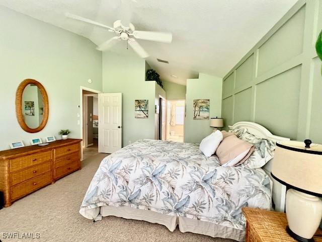1106 Islamorada Blvd, Punta Gorda, FL 33955 - bedroom featuring lofted ceiling, light colored carpet, connected bathroom, a ceiling fan, and a closet