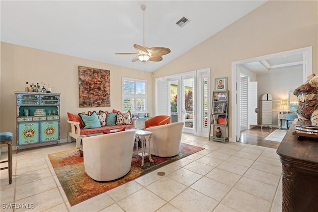 636 102nd Ave N, Naples, FL 34108 - living room with light tile patterned floors, a ceiling fan, and lofted ceiling