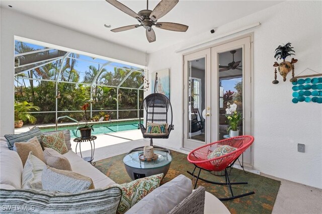 636 102nd Ave N, Naples, FL 34108 - living room with ceiling fan and a sunroom