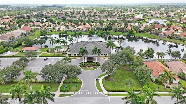 aerial view featuring a water view and a residential view