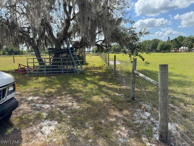 view of yard with fence
