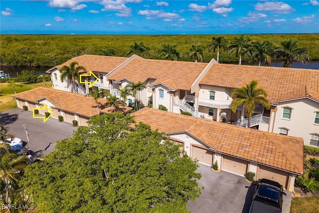 162 Newport Dr Unit 1208, Naples, FL 34114 - bird's eye view featuring a view of trees and a water view
