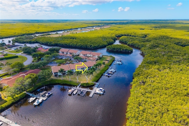 162 Newport Dr Unit 1208, Naples, FL 34114 - drone / aerial view featuring a water view and a forest view