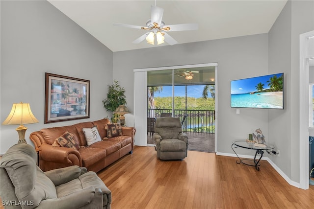 162 Newport Dr Unit 1208, Naples, FL 34114 - living area with light wood-type flooring, a ceiling fan, and baseboards