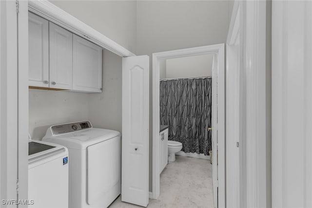 162 Newport Dr Unit 1208, Naples, FL 34114 - clothes washing area featuring cabinet space and washer and dryer