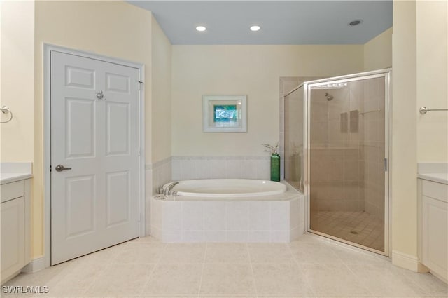 full bath featuring vanity, a garden tub, tile patterned flooring, recessed lighting, and a stall shower