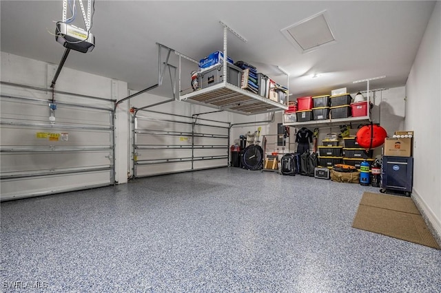 garage featuring a garage door opener