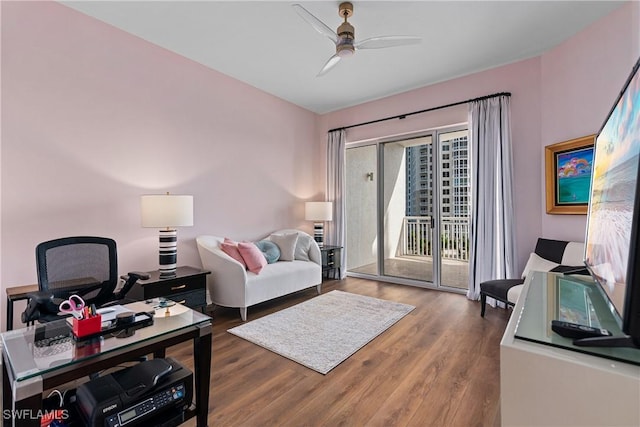 4931 Bonita Bay Blvd Unit 601, Bonita Springs, FL 34134 - living area with ceiling fan and wood finished floors