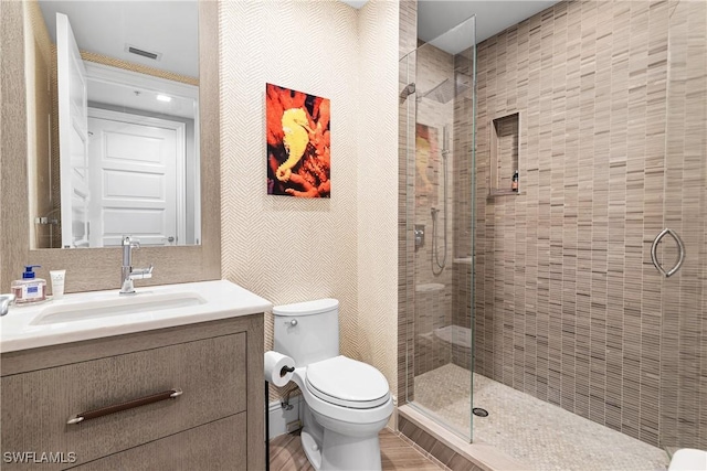 4931 Bonita Bay Blvd Unit 601, Bonita Springs, FL 34134 - bathroom featuring visible vents, vanity, toilet, and a shower stall