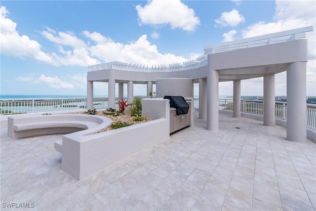 4931 Bonita Bay Blvd Unit 601, Bonita Springs, FL 34134 - view of patio / terrace with area for grilling, a water view, a pergola, and a grill