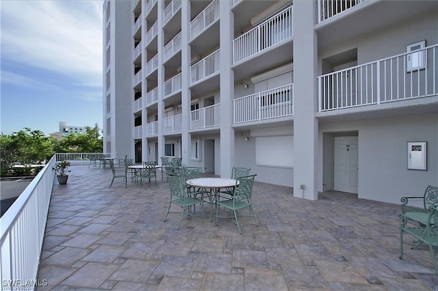 exterior space with outdoor dining space