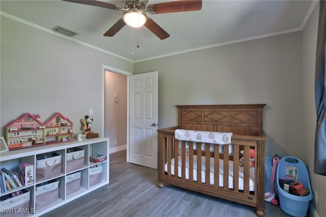 3690 27th Ave SW, Naples, FL 34117 - bedroom featuring ceiling fan, baseboards, wood finished floors, visible vents, and ornamental molding
