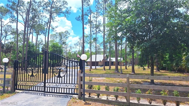 3690 27th Ave SW, Naples, FL 34117 - view of gate featuring fence