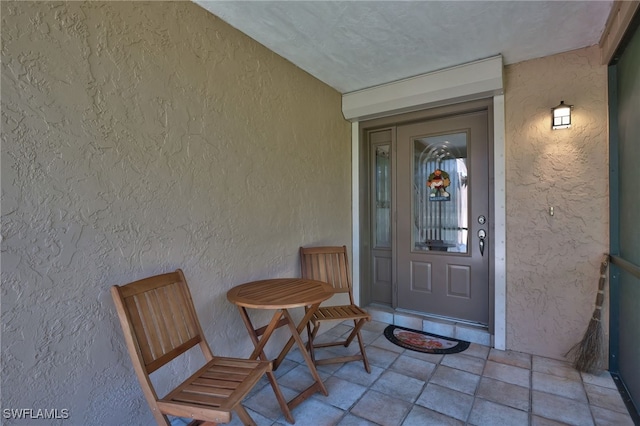 3690 27th Ave SW, Naples, FL 34117 - property entrance featuring stucco siding