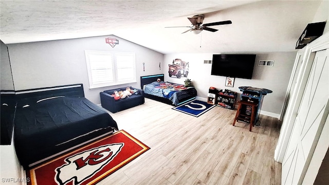 3690 27th Ave SW, Naples, FL 34117 - bedroom featuring visible vents, lofted ceiling, wood finished floors, baseboards, and ceiling fan