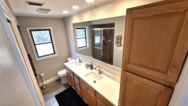 3690 27th Ave SW, Naples, FL 34117 - bathroom with vanity, toilet, baseboards, visible vents, and a stall shower