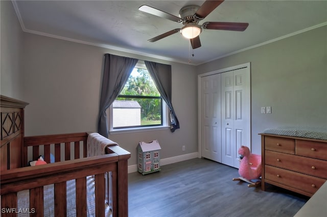 3690 27th Ave SW, Naples, FL 34117 - bedroom with baseboards, ornamental molding, wood finished floors, and a closet