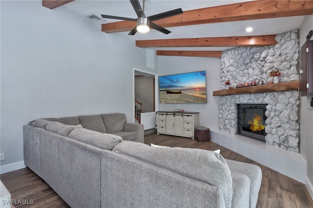 3690 27th Ave SW, Naples, FL 34117 - living room featuring ceiling fan, lofted ceiling with beams, a stone fireplace, baseboards, and visible vents
